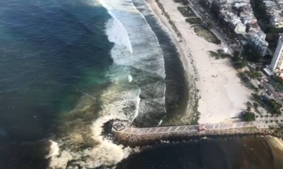 Após rompimento de ecobarreira, gigogas invadem Praia da Barra